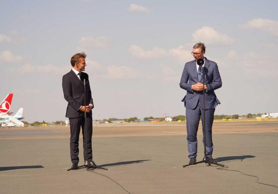 French president Emanuel Macron standing on tar of the Airport Nikola Tesla in Belgrade.